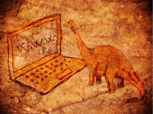 prehistoric petroglyph with computer and dinosaur